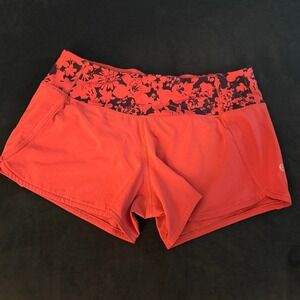 Lululemon Athletica Orange‎ Shorts with Black Floral Detail